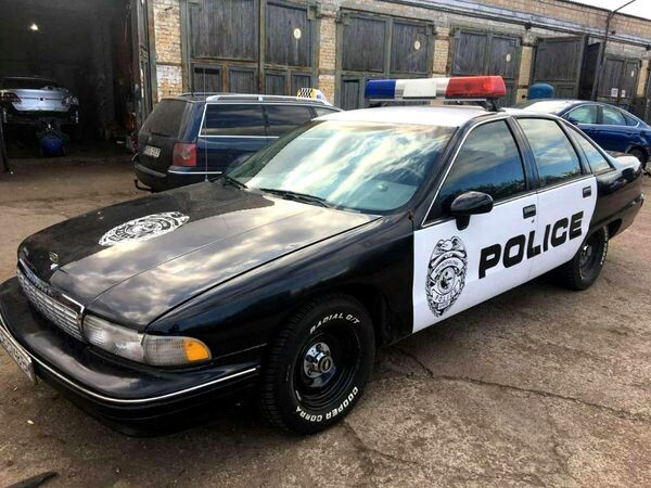 382 автомобиль полиции Chevrolet Caprice 